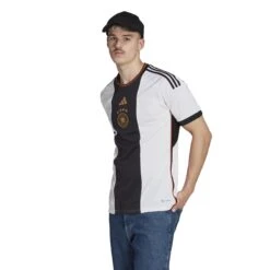 ADIDAS Heimtrikot Weltmeisterschaft 2022 Deutschland -ADIDAS Verkäufe adidas hj9606 4 apparel on model standard view white